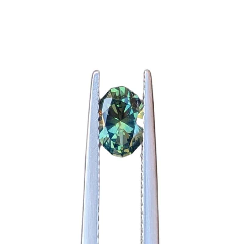 0.91ct teal parti oval cut australian sapphire