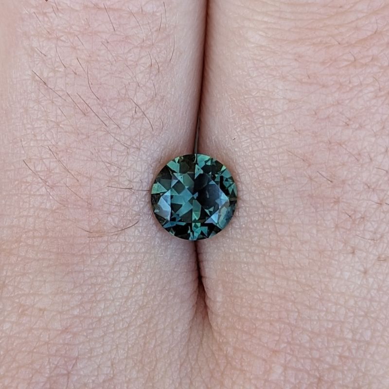 1.39ct round brilliant cut teal australian sapphire