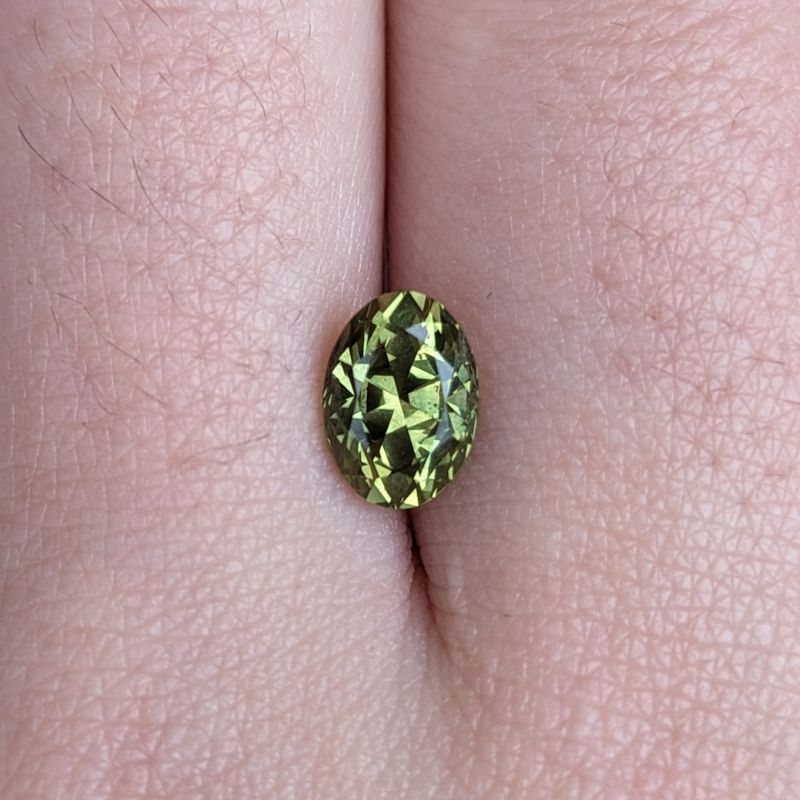 2.09ct oval brilliant cut olive green parti australian sapphire