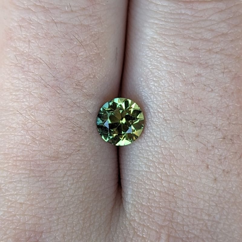 1.30ct round brilliant cut yellow green australian parti sapphire