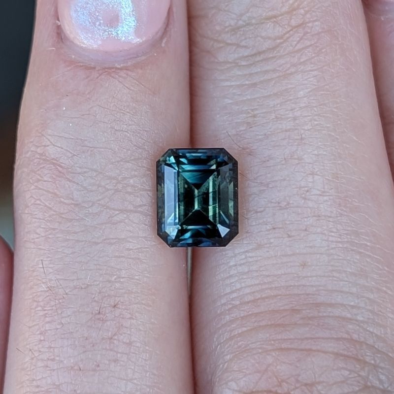 2.46ct teal parti emerald cut australian sapphire