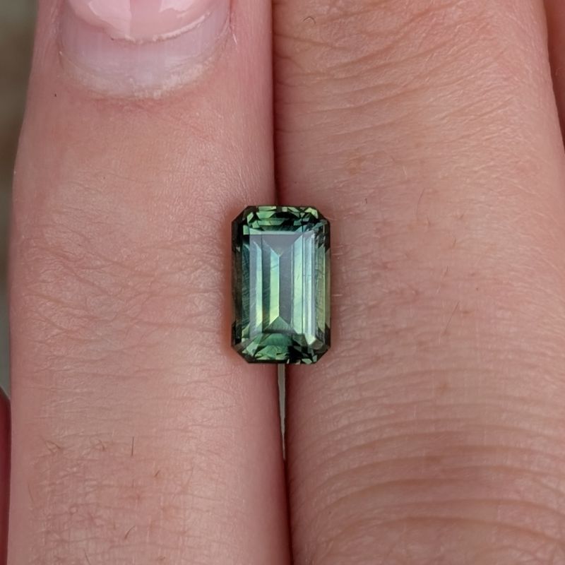 1.74ct emerald cut green parti australian sapphire